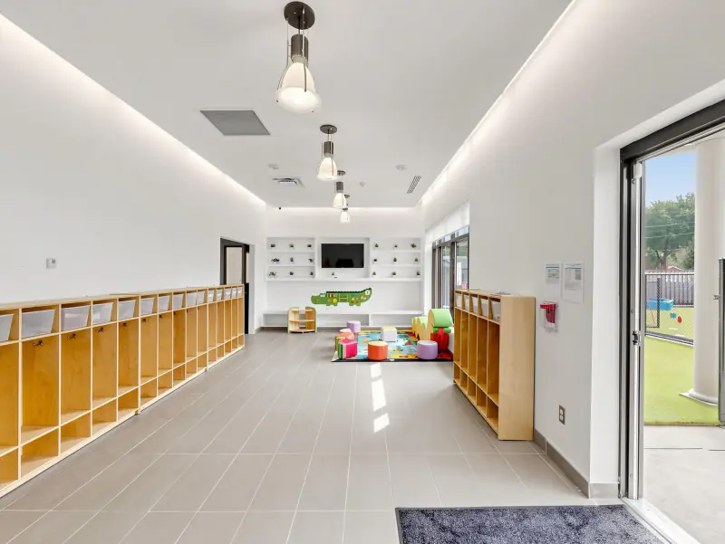 Cubbies along the wall and open floor in the middle.