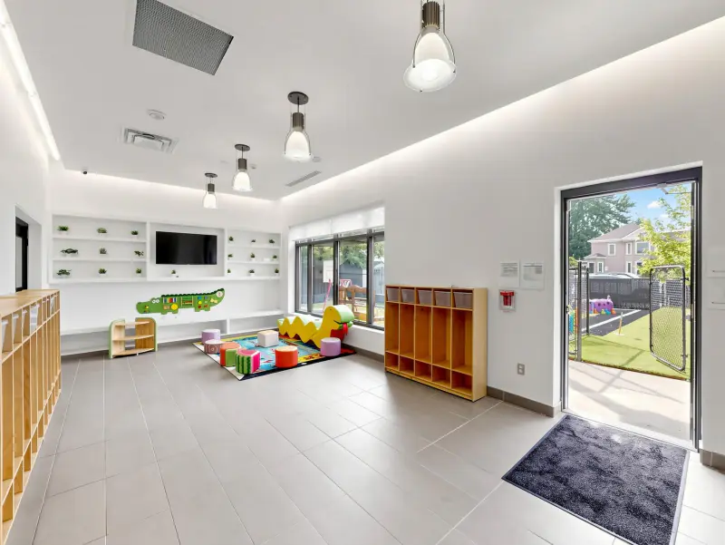 Bright play space that looks straight out onto the yard.